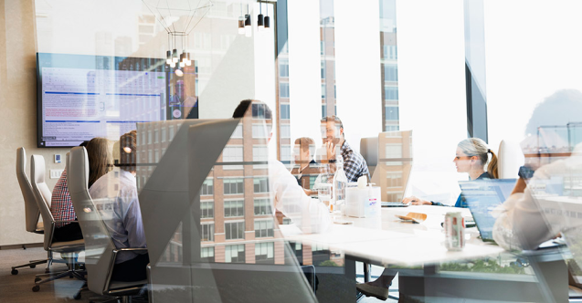 Employees in a Meeting Room